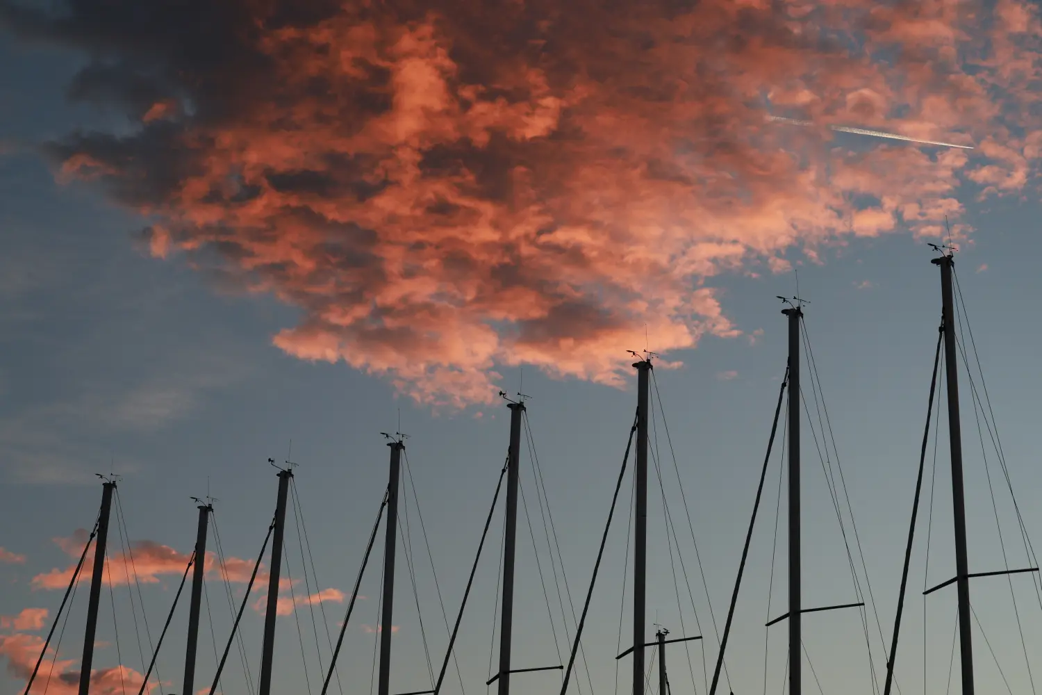 Successful Sailing - Sunset clouds over the boats