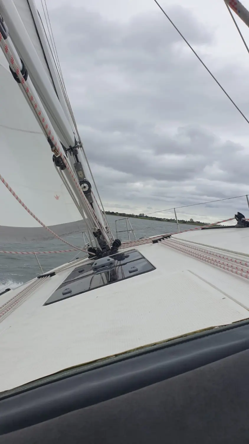 Successful Sailing - Boat sailing in Sea fog