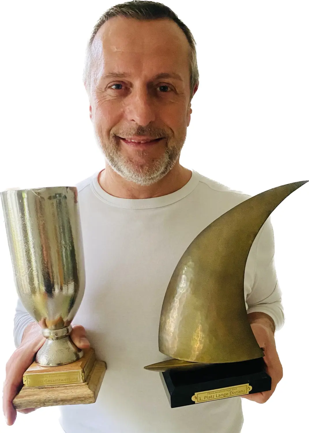 Successful Sailing - Skipper Thomas Lindloff holding trophies
